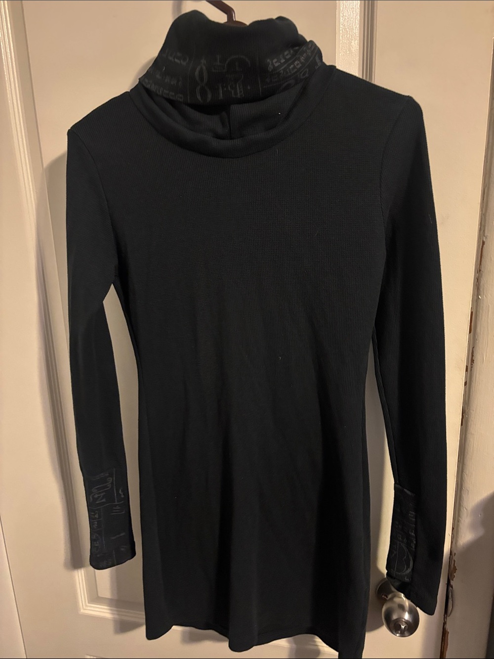 Women’s Black Long Sleeve Turtleneck Top with Printed Trim